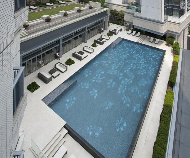 Outdoor swimming pool between the towers